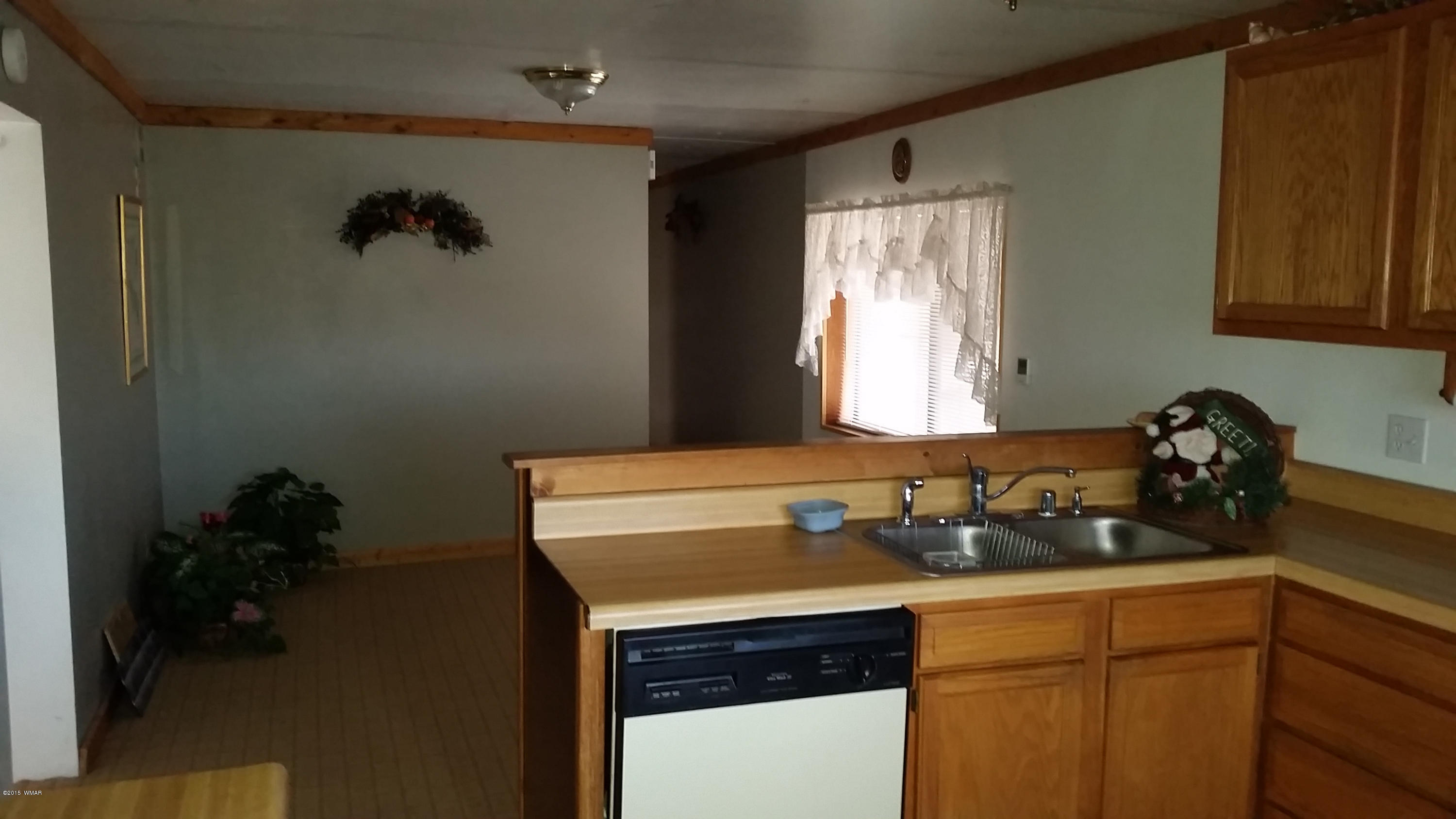 31 Alpine Lane Concho, AZ 85924 - Photo 11 of 16 a kitchen with a sink and cabinets