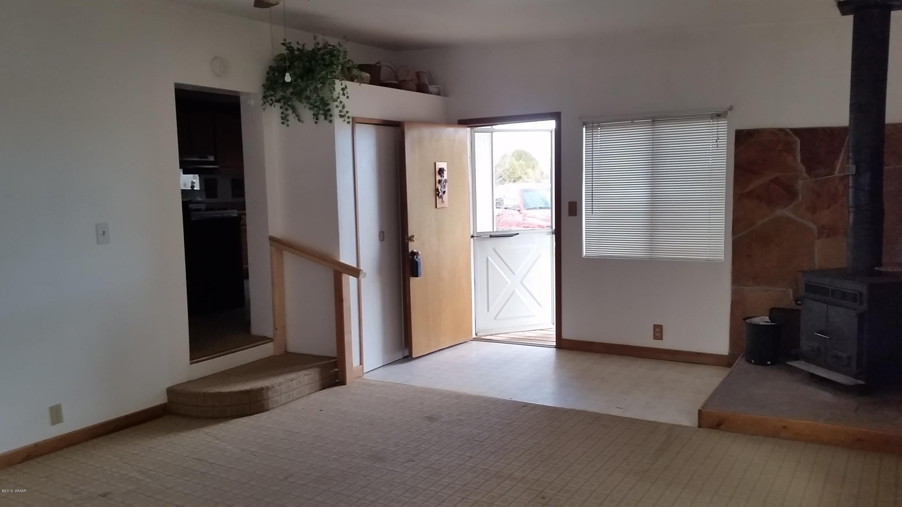 31 Alpine Lane Concho, AZ 85924 - Photo 2 of 16 an empty room with closet and a window