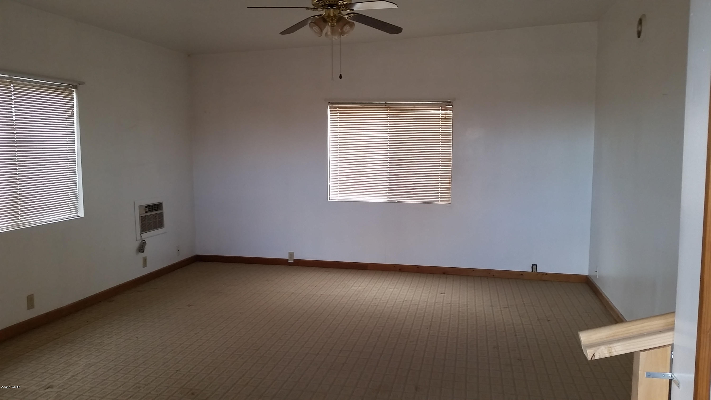 31 Alpine Lane Concho, AZ 85924 - Photo 9 of 16 an empty room with a window