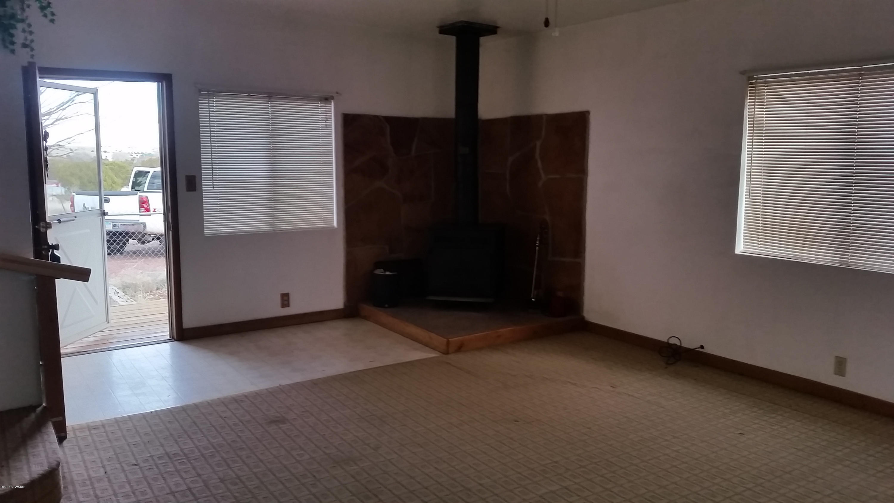 31 Alpine Lane Concho, AZ 85924 - Photo 10 of 16 an empty room with windows