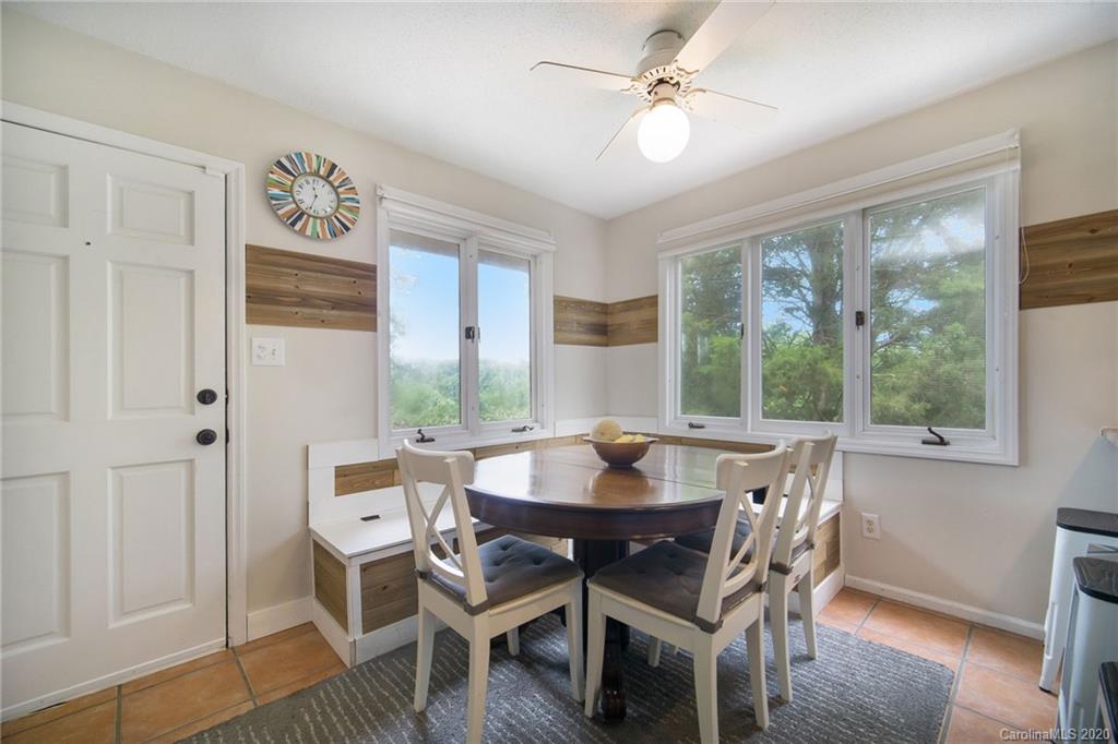 3927 Rounding Run Road Charlotte, NC 28277 - Photo 18 of 48 a view of a dining room with furniture window and wooden floor