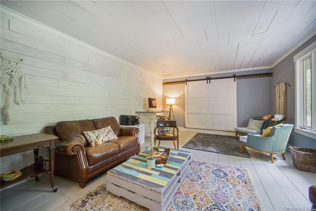 3927 Rounding Run Road Charlotte, NC 28277 - Photo 20 of 48 a living room with furniture and wooden floor