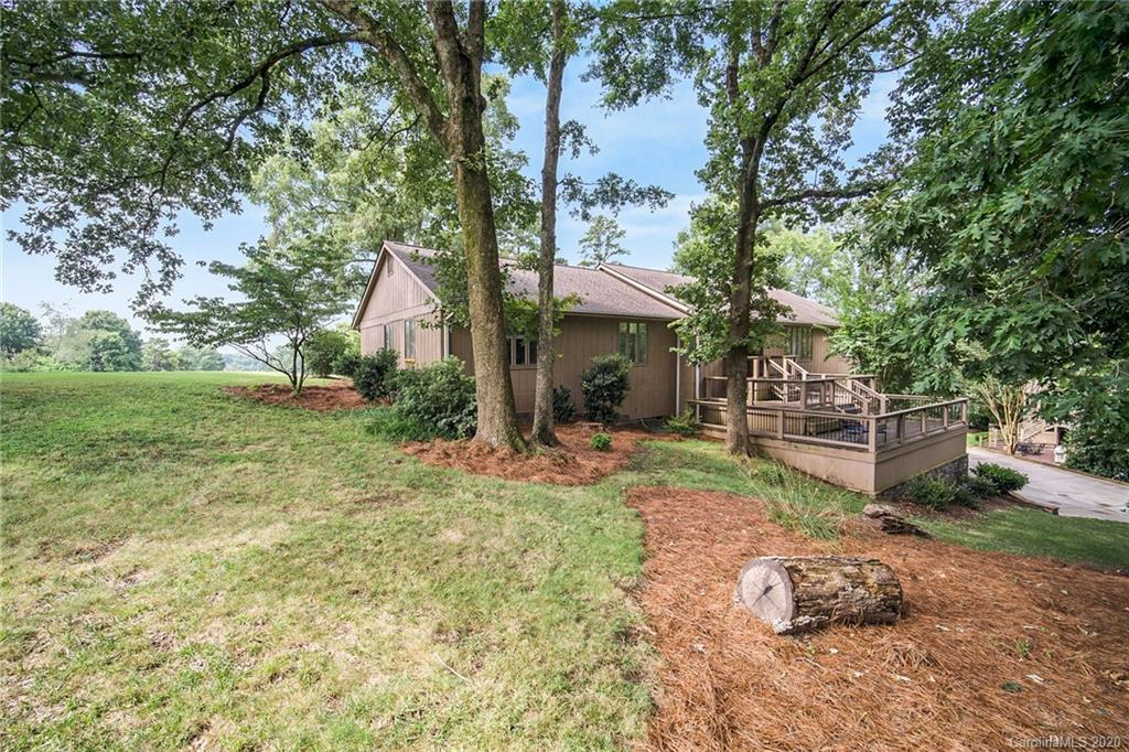 3927 Rounding Run Road Charlotte, NC 28277 - Photo 3 of 48 a view of a house with backyard and a tree