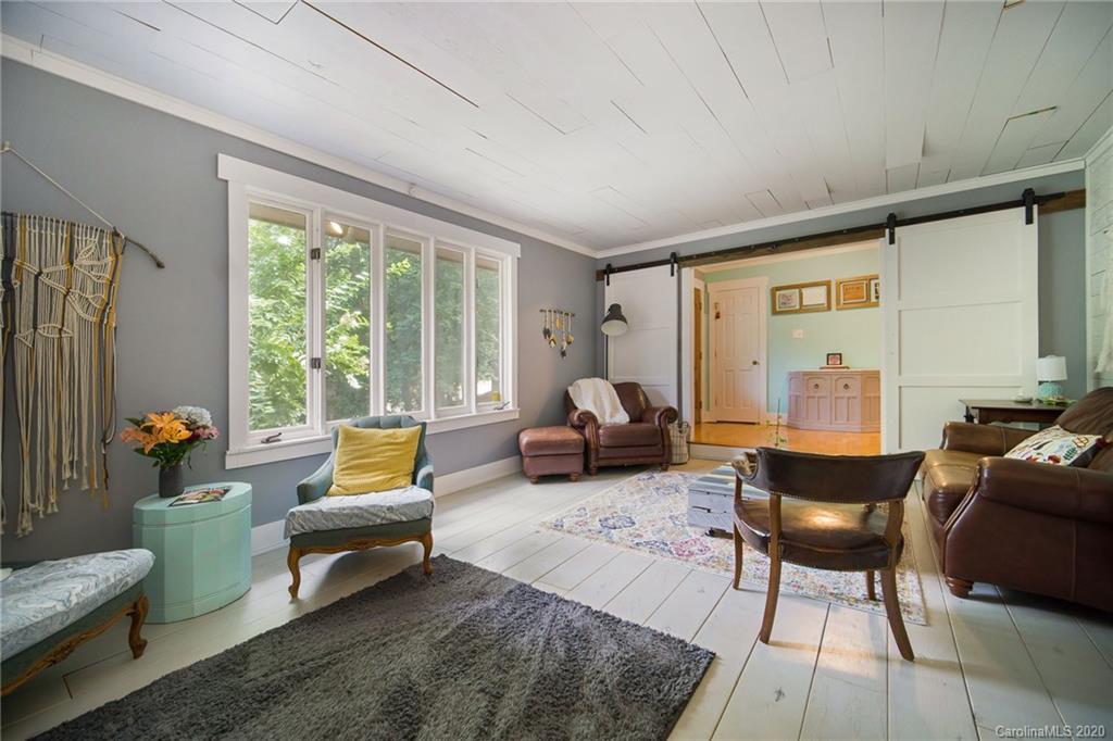 3927 Rounding Run Road Charlotte, NC 28277 - Photo 24 of 48 a living room with furniture and a large window