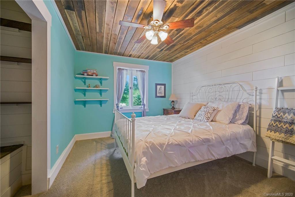 3927 Rounding Run Road Charlotte, NC 28277 - Photo 27 of 48 a bedroom with a bed and a window