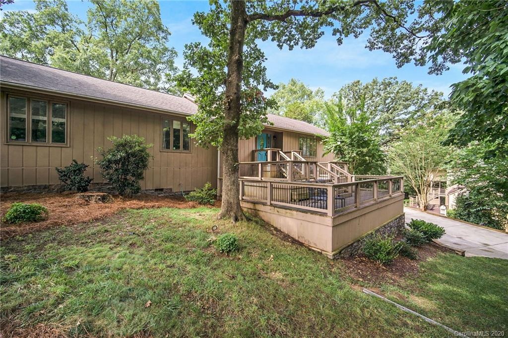 3927 Rounding Run Road Charlotte, NC 28277 - Photo 4 of 48 a view of a house with backyard and trees