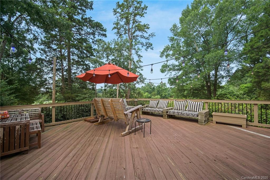 3927 Rounding Run Road Charlotte, NC 28277 - Photo 41 of 48 a view of balcony with outdoor seating and wooden floor