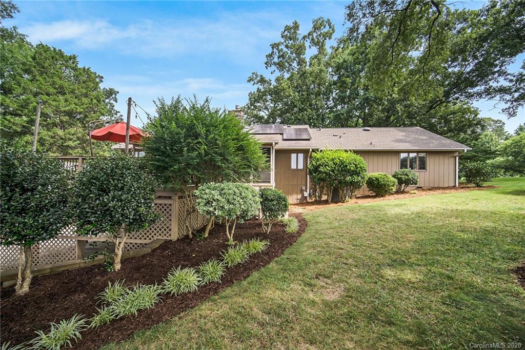 3927 Rounding Run Road Charlotte, NC 28277 - Photo 44 of 48 a front view of a house with garden