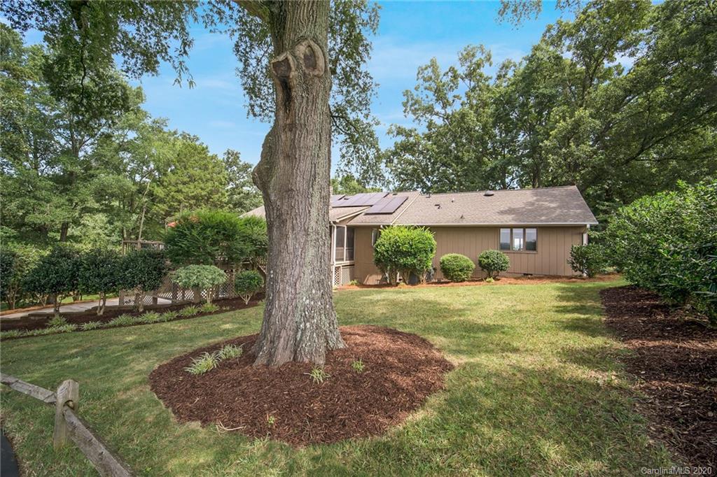 3927 Rounding Run Road Charlotte, NC 28277 - Photo 45 of 48 a front view of a house with a yard