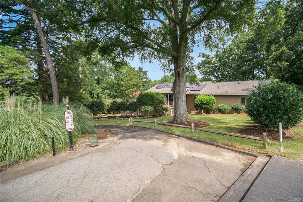 3927 Rounding Run Road Charlotte, NC 28277 - Photo 46 of 48 a view of a house with a yard