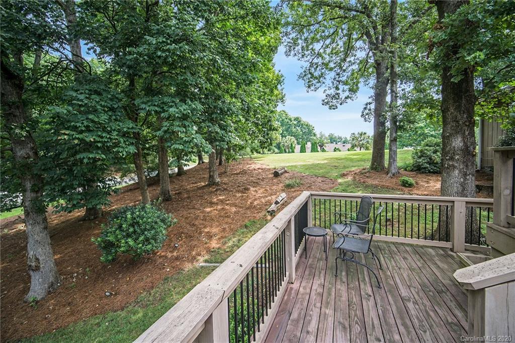3927 Rounding Run Road Charlotte, NC 28277 - Photo 6 of 48 a view of backyard with deck and outdoor seating