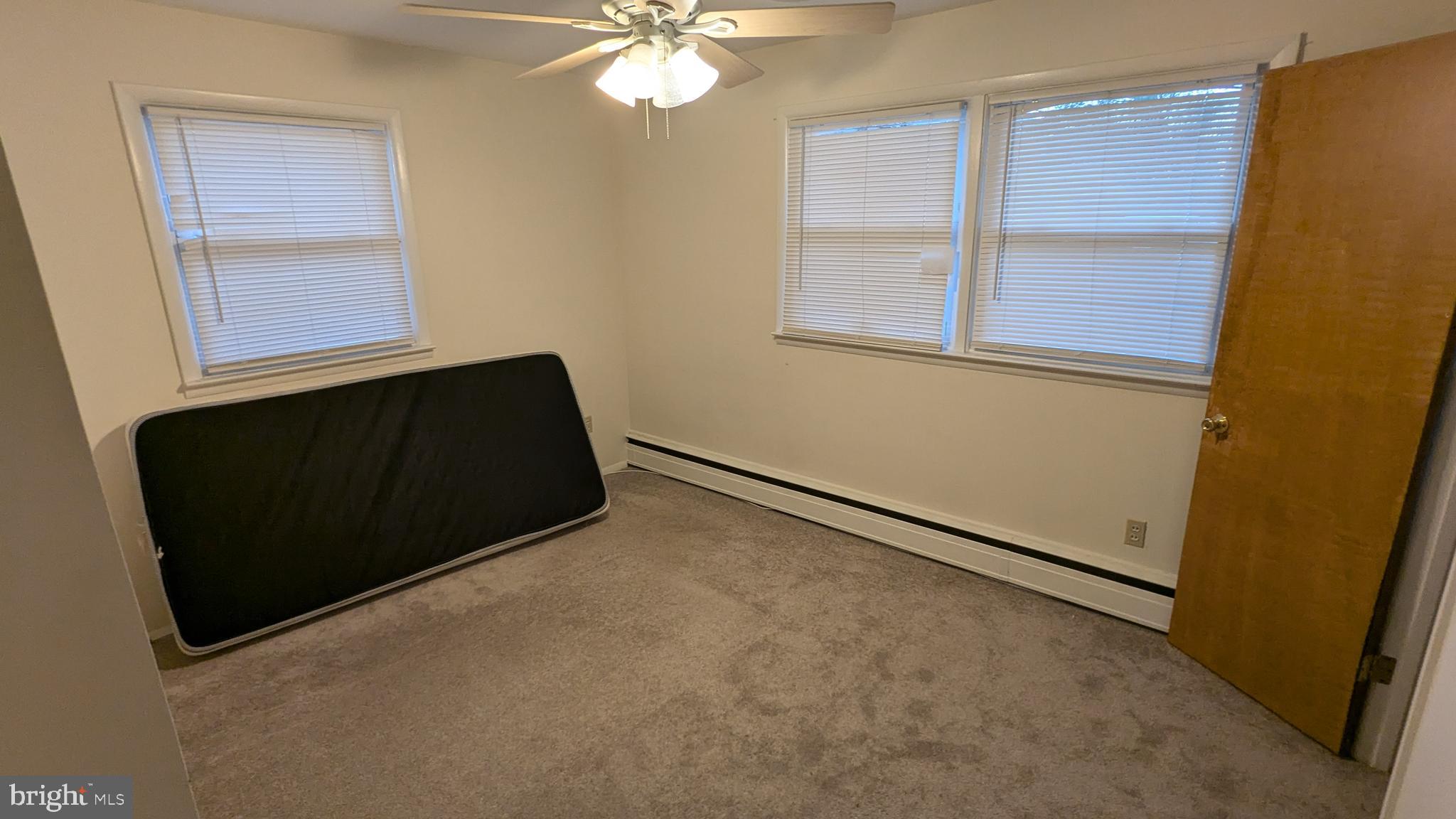 4032 Quakerbridge Road Lawrenceville, NJ 08648 - Photo 13 of 18 a view of an empty room with a window