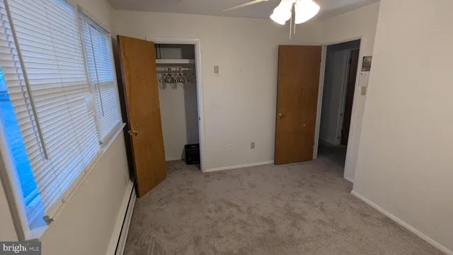 a view of a room with a hallway