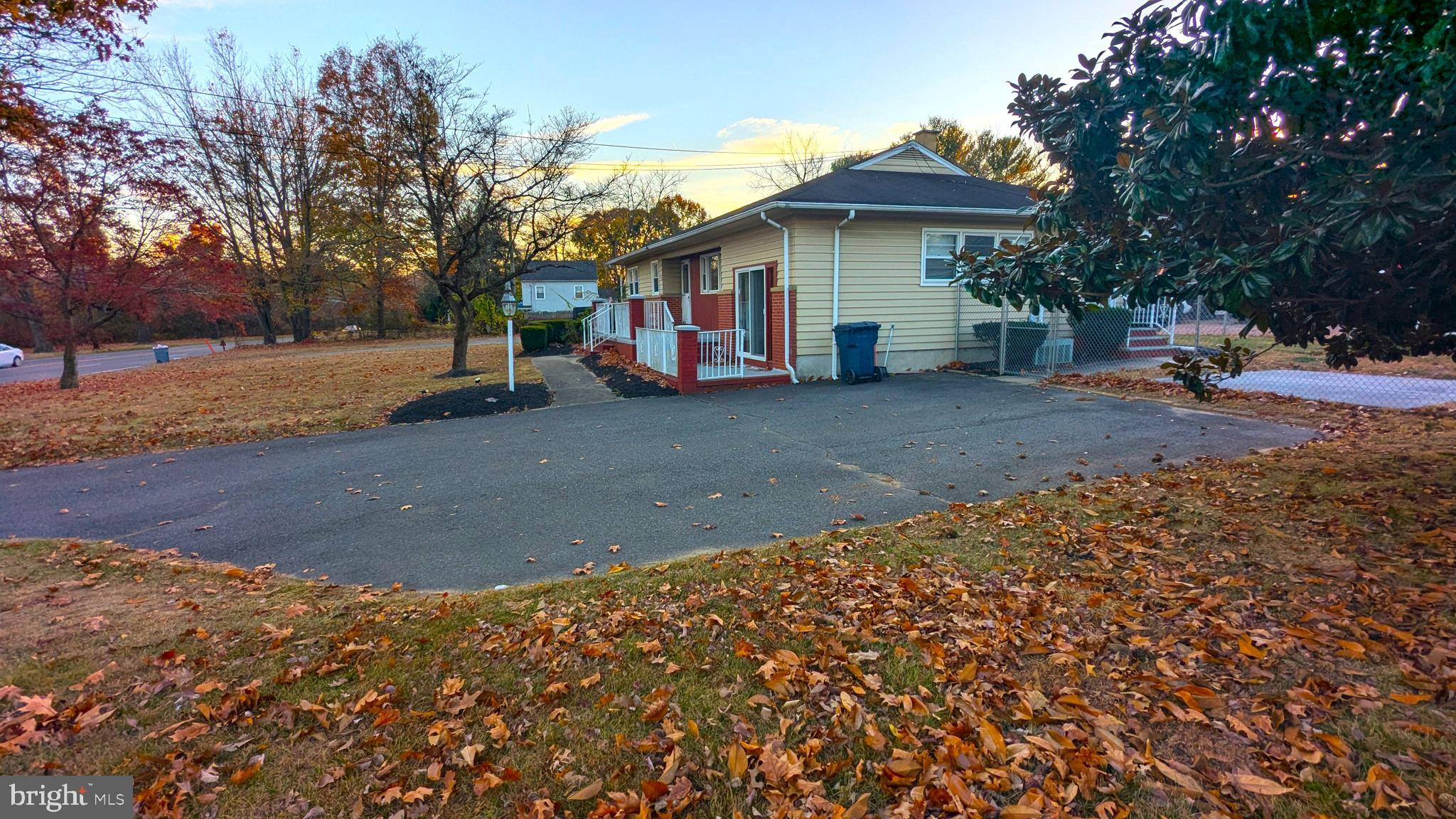 4032 Quakerbridge Road Lawrenceville, NJ 08648 - Photo 18 of 18 a view of a house with a yard