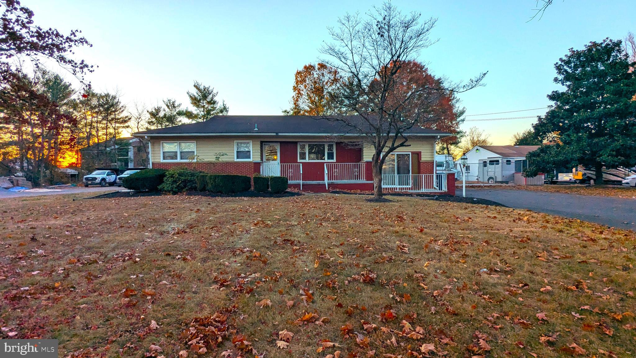 4032 Quakerbridge Road Lawrenceville, NJ 08648 - Photo 2 of 18 a view of house with outdoor space and parking