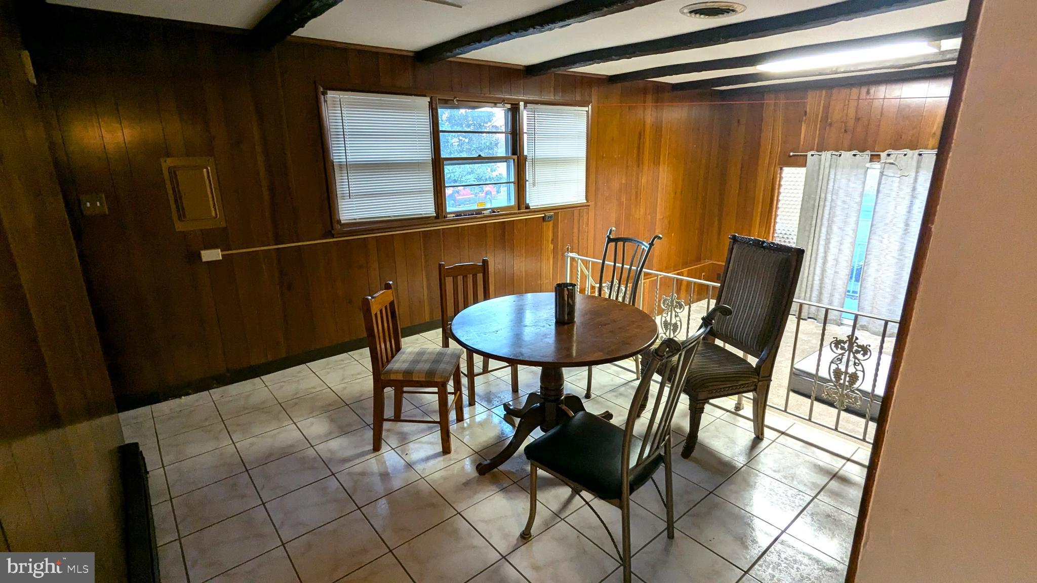 4032 Quakerbridge Road Lawrenceville, NJ 08648 - Photo 5 of 18 a view of a dining room with furniture and a window