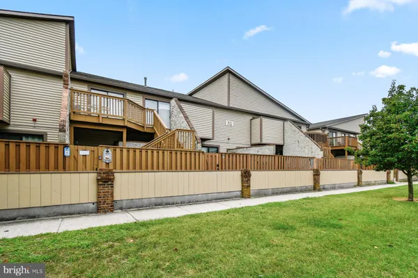 a view of backyard with deck