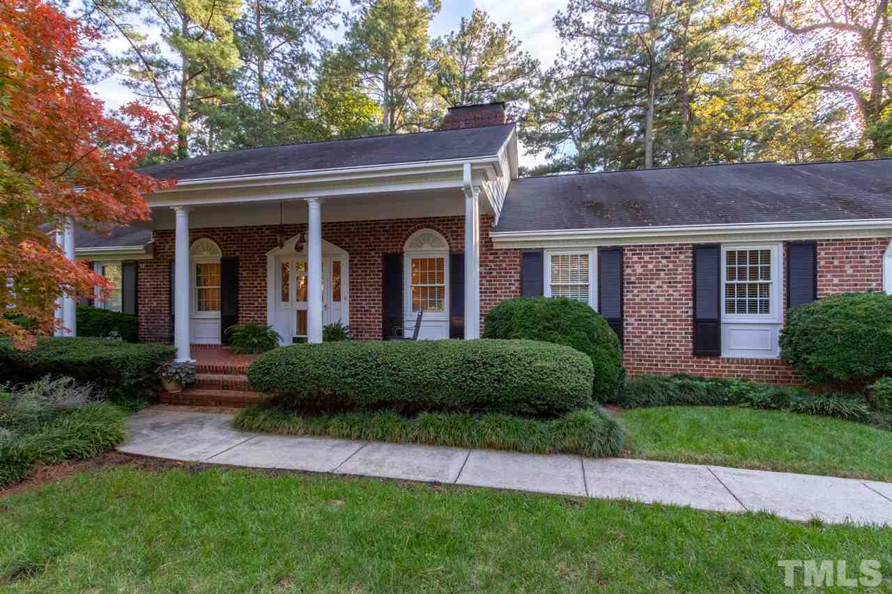 3113 Cartwright Drive Raleigh, NC 27612 - Photo 2 of 25 a front view of a house with a yard