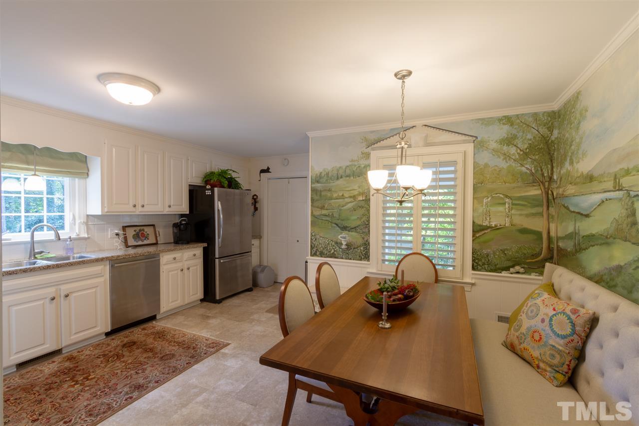 3113 Cartwright Drive Raleigh, NC 27612 - Photo 12 of 25 a living room with furniture a window and appliances