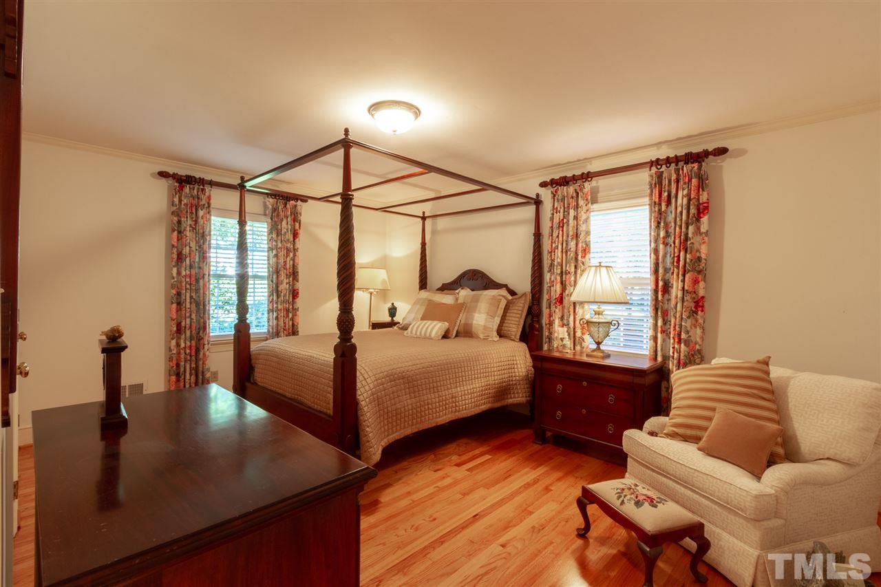 3113 Cartwright Drive Raleigh, NC 27612 - Photo 14 of 25 a bedroom with furniture and a window