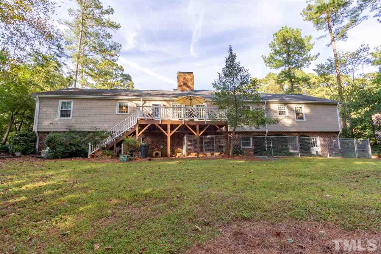 3113 Cartwright Drive Raleigh, NC 27612 - Photo 25 of 25 a view of a house with yard and front view of a house
