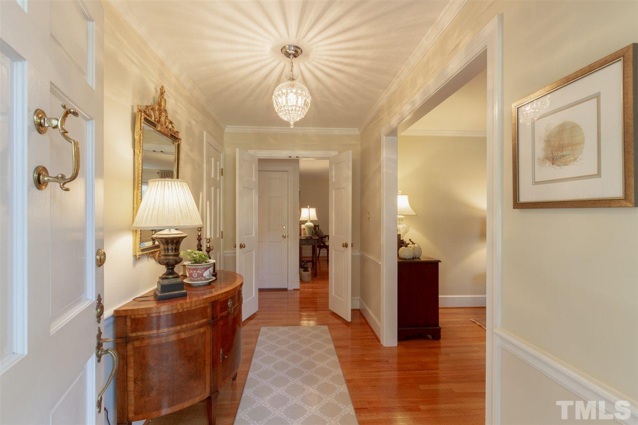 3113 Cartwright Drive Raleigh, NC 27612 - Photo 4 of 25 a very nice looking room with a mirror