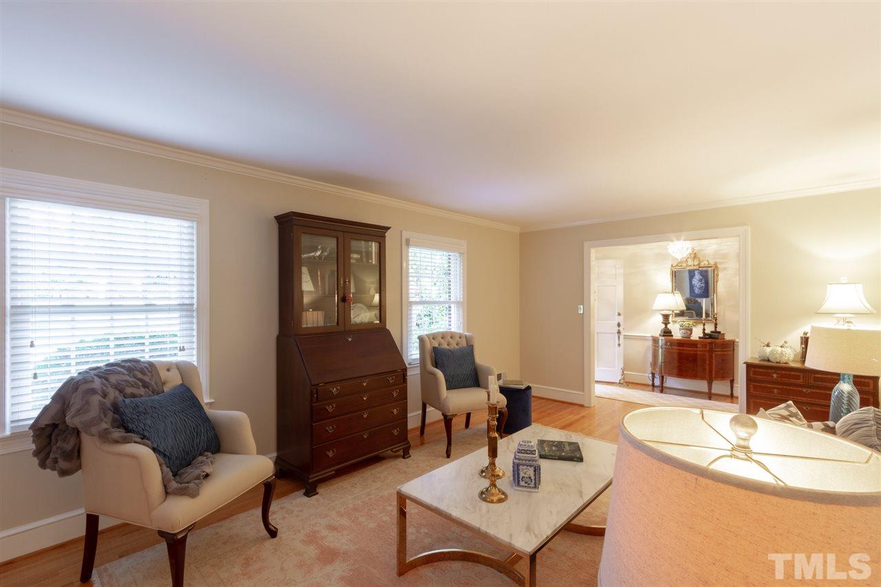 3113 Cartwright Drive Raleigh, NC 27612 - Photo 6 of 25 a living room with furniture and wooden floor