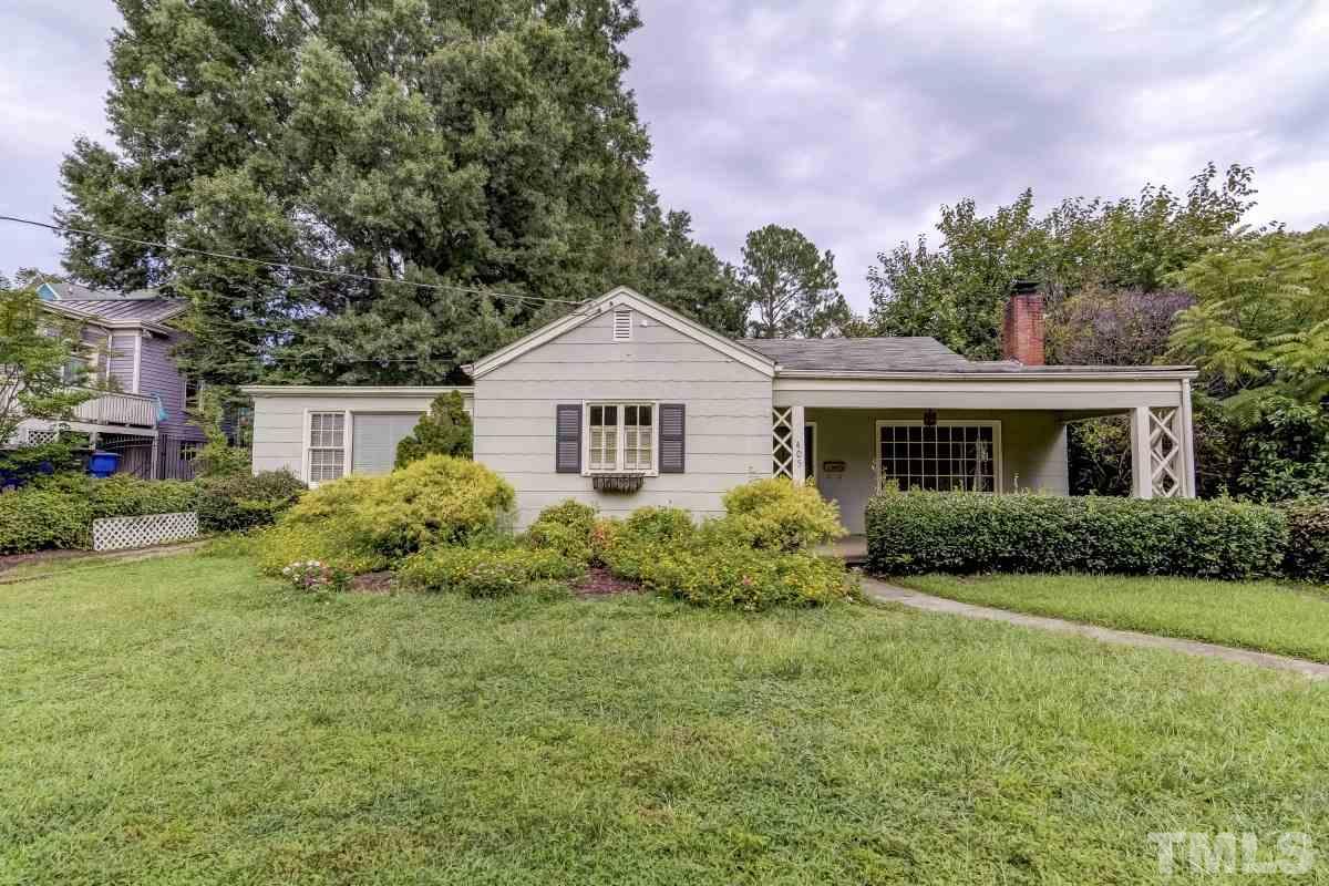 405 East Franklin Street Raleigh, NC 27604 - Photo 1 of 17 a front view of a house with a yard and potted plants