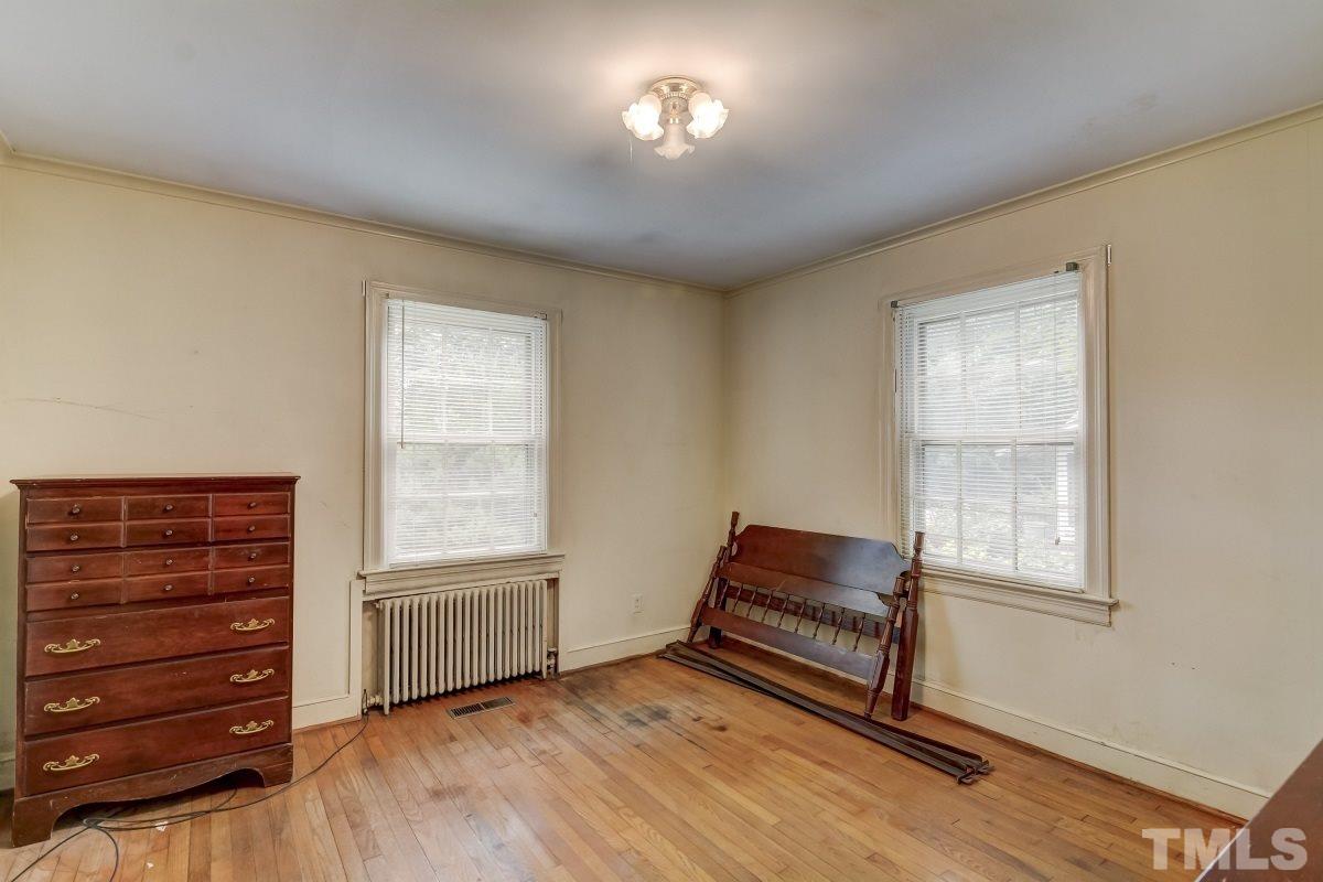 405 East Franklin Street Raleigh, NC 27604 - Photo 12 of 17 a living room with furniture and a window