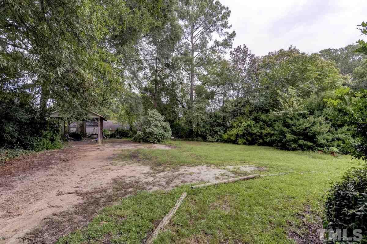 405 East Franklin Street Raleigh, NC 27604 - Photo 15 of 17 a view of a backyard with a trees