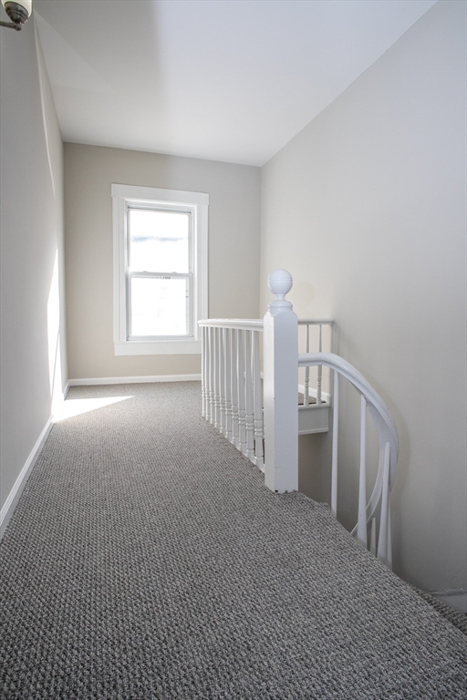 57-59 Cottage Street Athol, MA 01331 - Photo 24 of 42 a view of hallway with stairs and a window