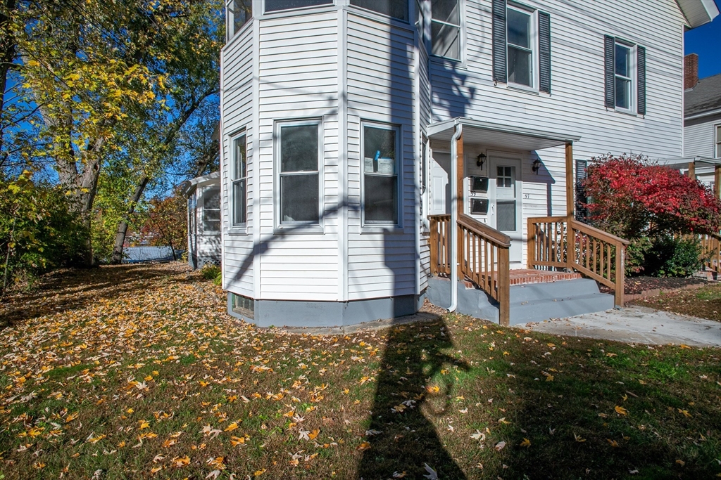 57-59 Cottage Street Athol, MA 01331 - Photo 3 of 42 a front view of a house with a garden