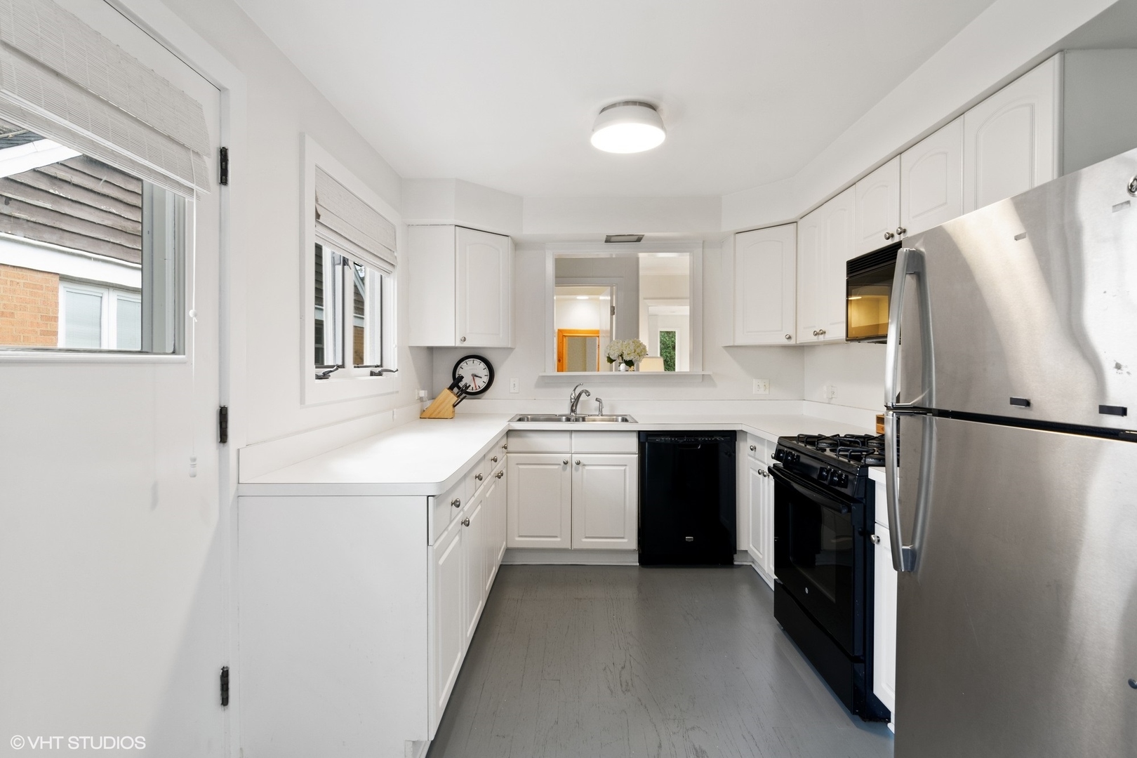 1133 Willow Road Winnetka, IL 60093 - Photo 13 of 26 a kitchen with a refrigerator sink and stove