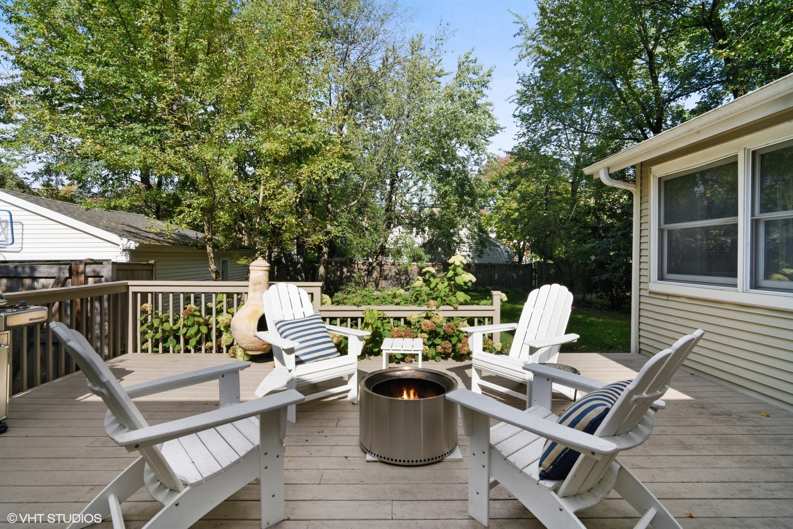 1133 Willow Road Winnetka, IL 60093 - Photo 22 of 26 a view of roof deck with chairs and wooden fence