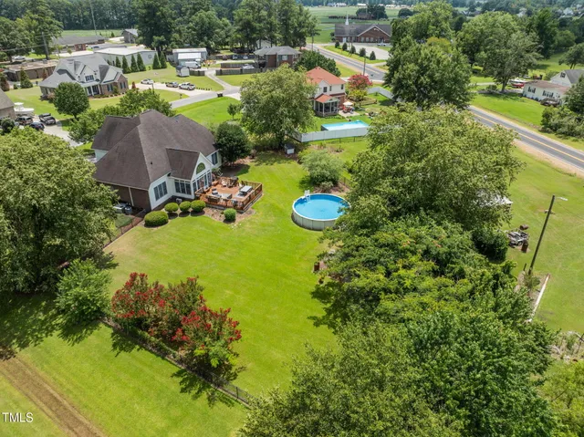 a view of a house with a swimming pool
