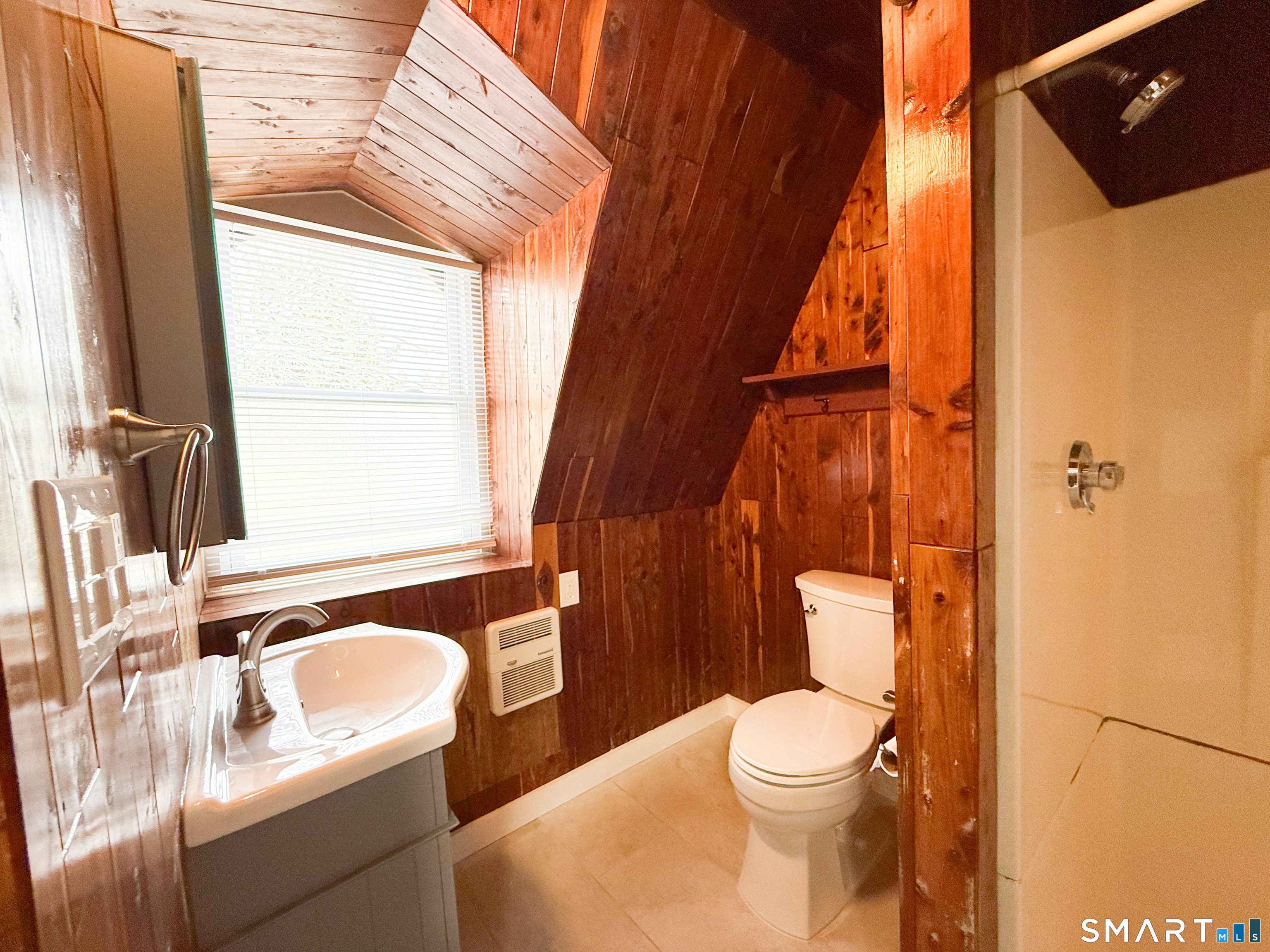 40 Franklin Street New London, CT 06320 - Photo 6 of 9 a bathroom with a granite countertop sink toilet and shower