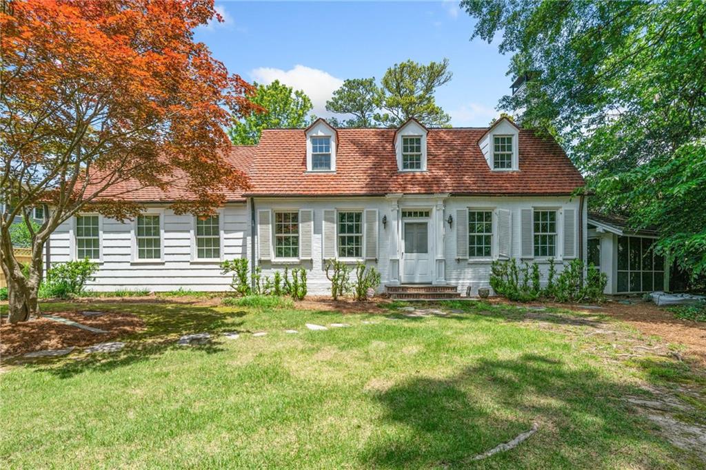 1482 North Decatur Road Atlanta, GA 30306 - Photo 1 of 1 a front view of a house with a yard and trees