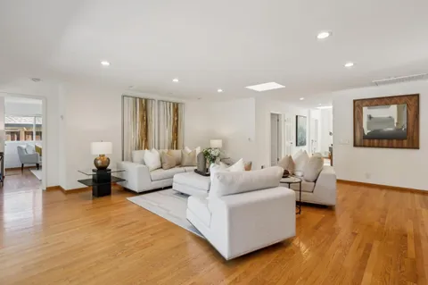 a kitchen with a table and chairs in it