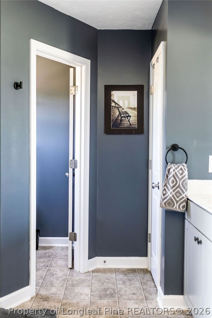 210 McGougan Road Lumber Bridge, NC 28357 - Photo 28 of 47 a view of a hallway with a door
