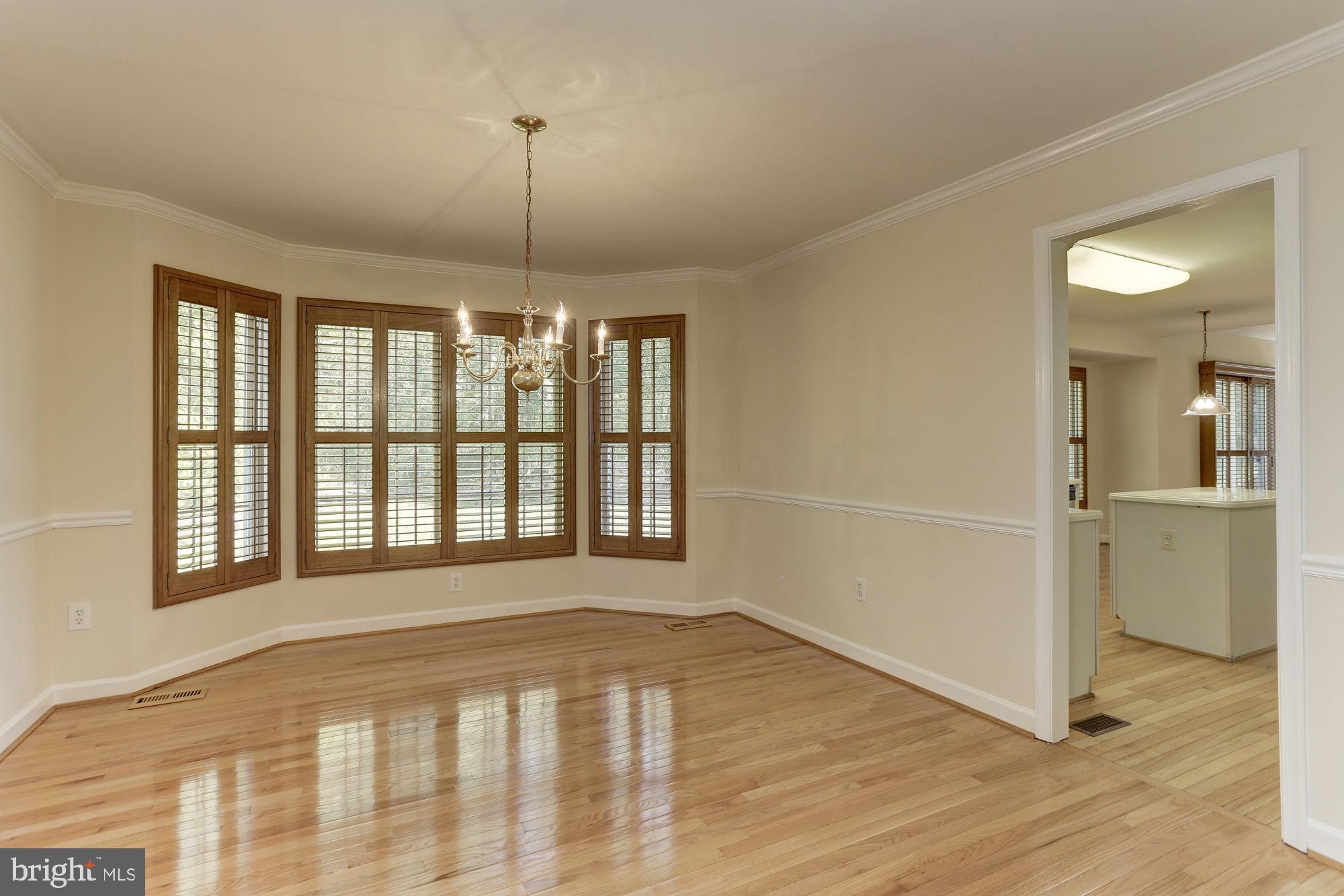 9514 Ridgeview Drive Columbia, MD 21046 - Photo 15 of 60 Formal dining room with bay window