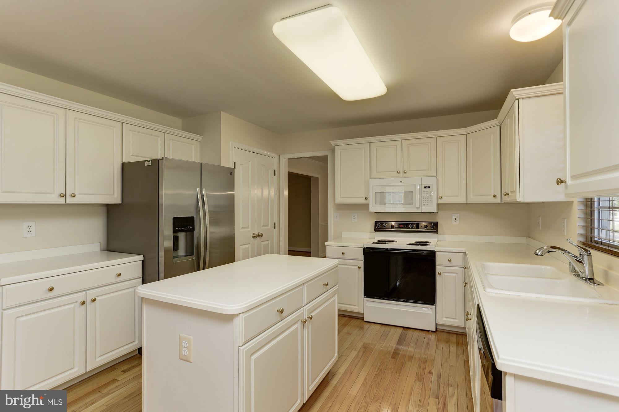 9514 Ridgeview Drive Columbia, MD 21046 - Photo 18 of 60 Kitchen has center island