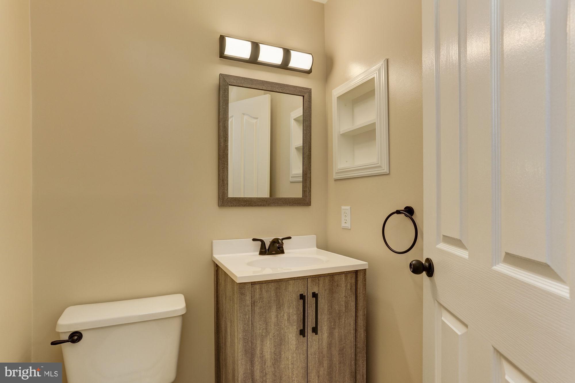 9514 Ridgeview Drive Columbia, MD 21046 - Photo 27 of 60 Main level powder room