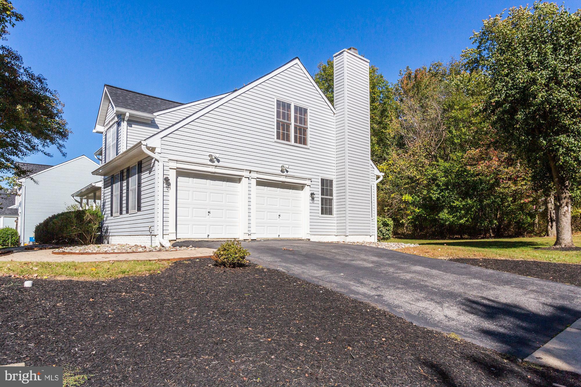 9514 Ridgeview Drive Columbia, MD 21046 - Photo 59 of 60 2 car side load garage with asphalt driveway