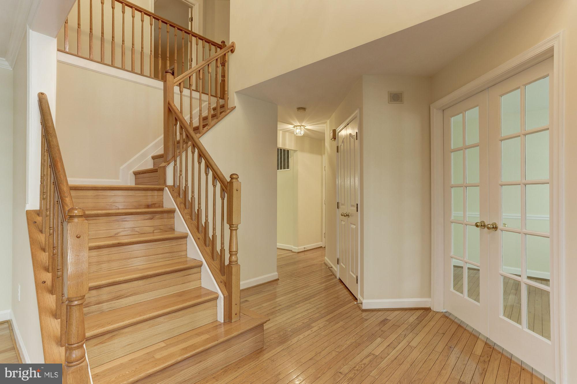 9514 Ridgeview Drive Columbia, MD 21046 - Photo 7 of 60 Entry foyer with glass doors to main level office