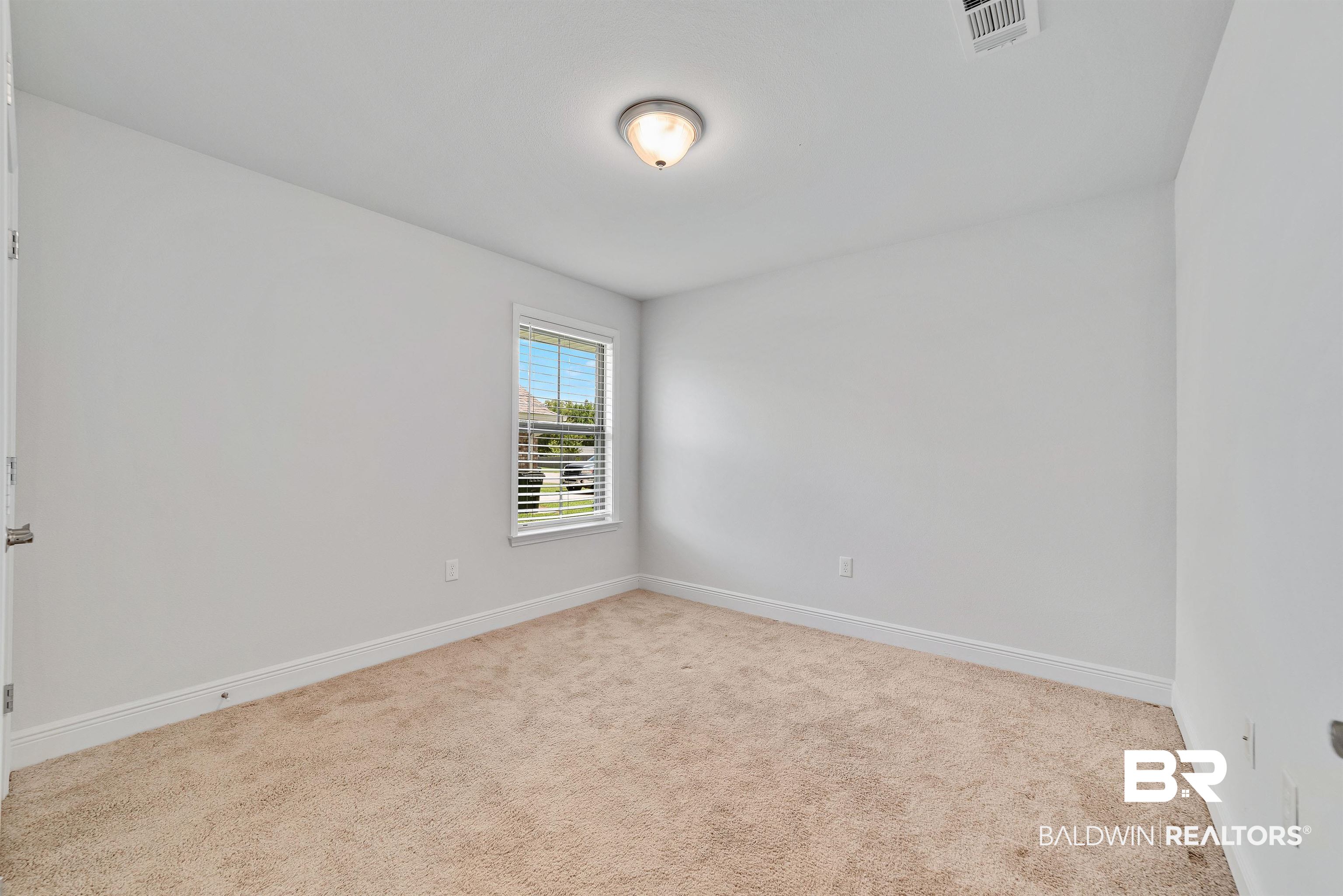 13155 Wishbone Court Foley, AL 36535 - Photo 25 of 39 Empty room with light colored carpet