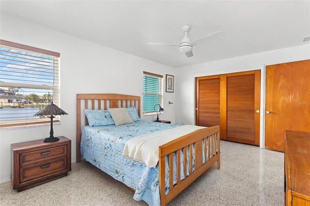 a bathroom with a sink mirror vanity and toilet