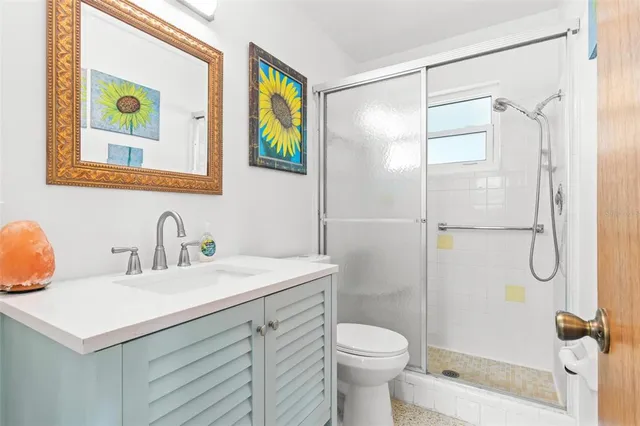 a bedroom with bed and a window