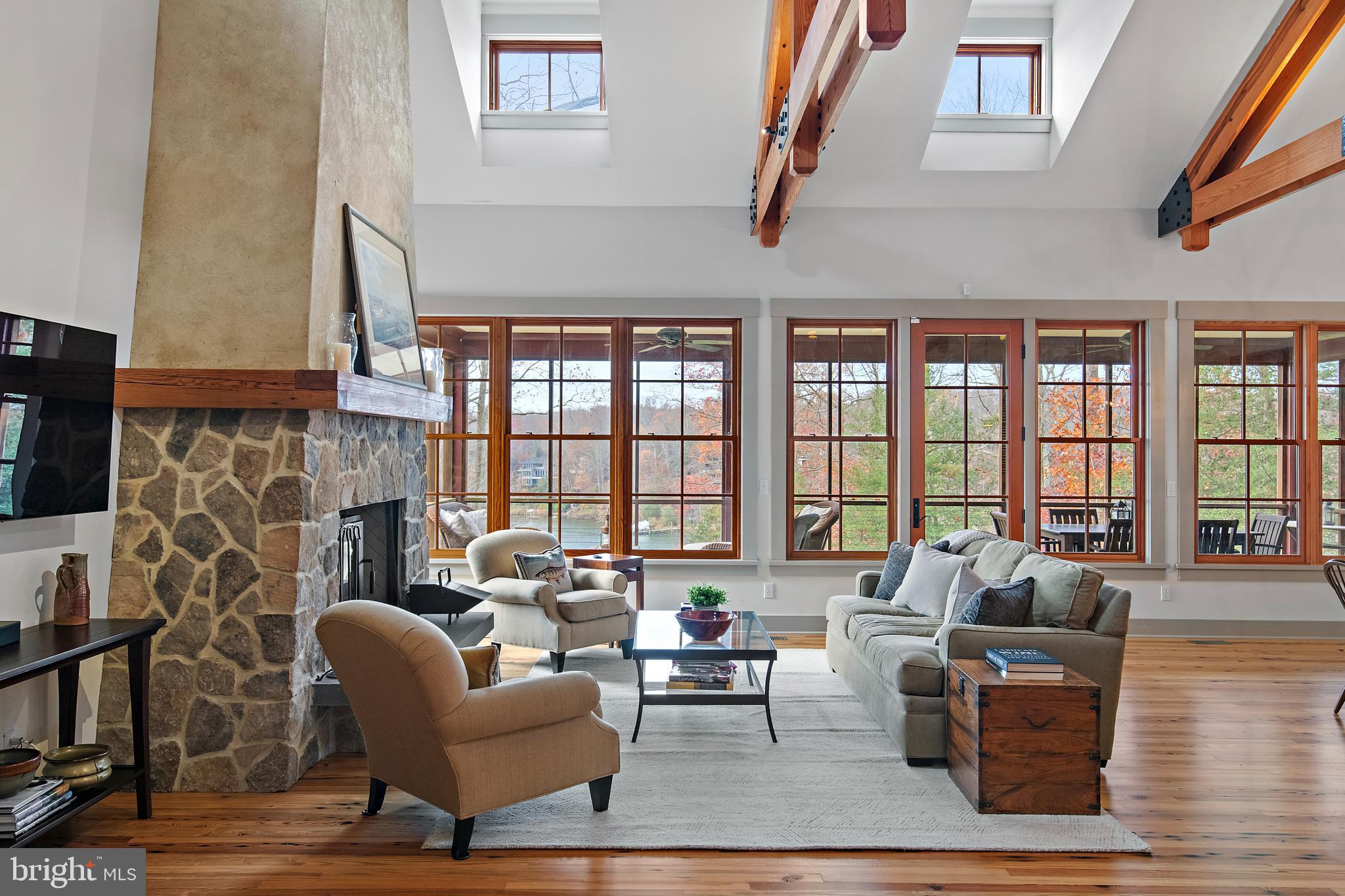 397 Forelands Road Annapolis, MD 21401 - Photo 14 of 83 a living room with furniture and large windows
