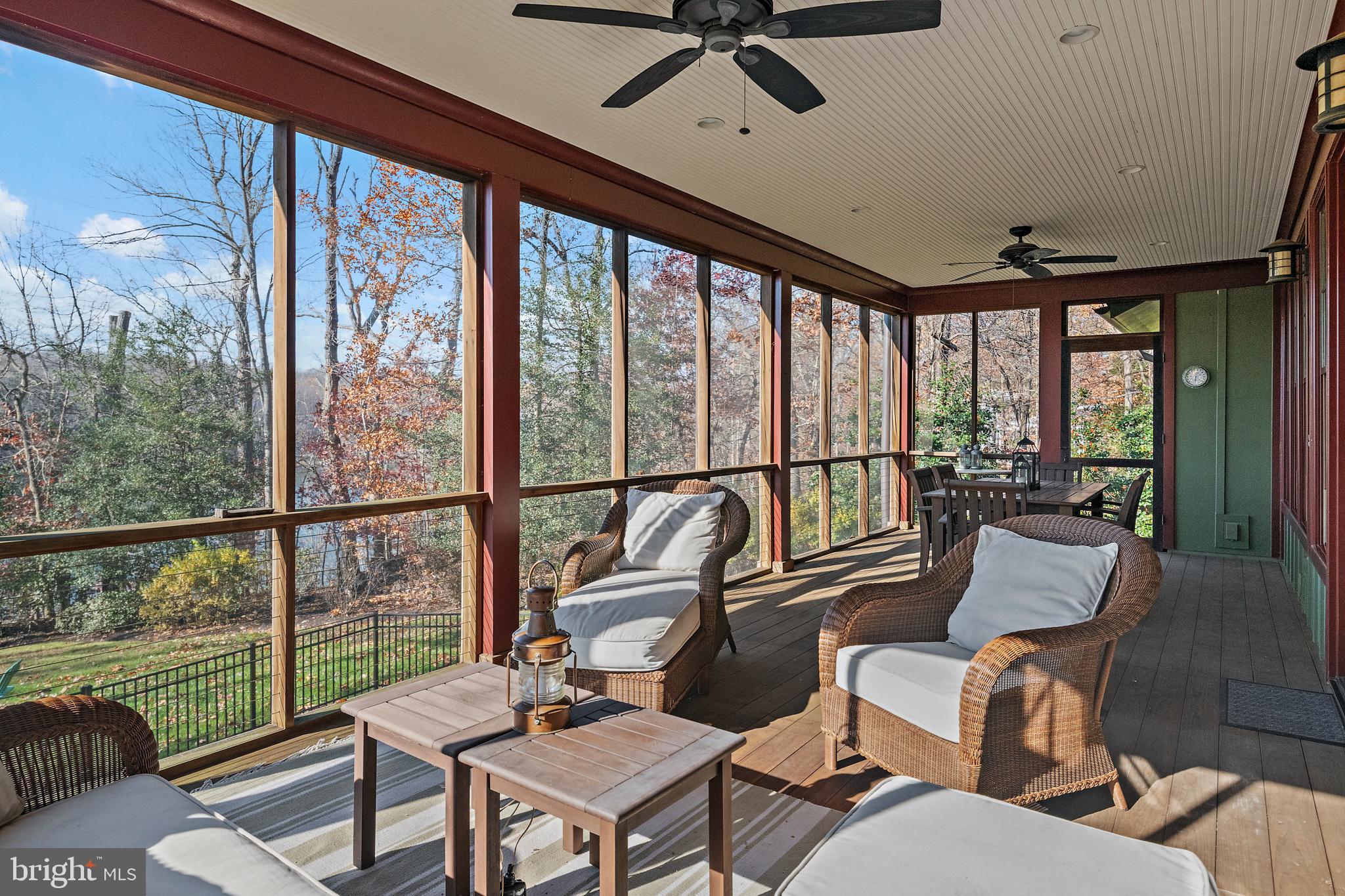 397 Forelands Road Annapolis, MD 21401 - Photo 21 of 83 a living room with furniture and a floor to ceiling window