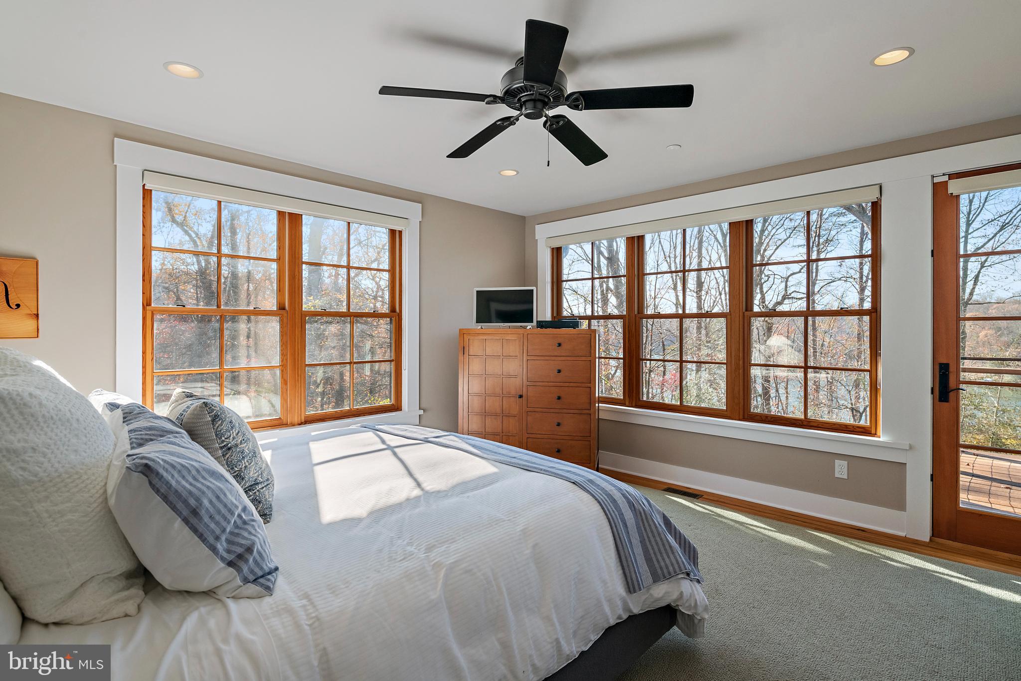397 Forelands Road Annapolis, MD 21401 - Photo 40 of 83 a bedroom with a large bed and a large window